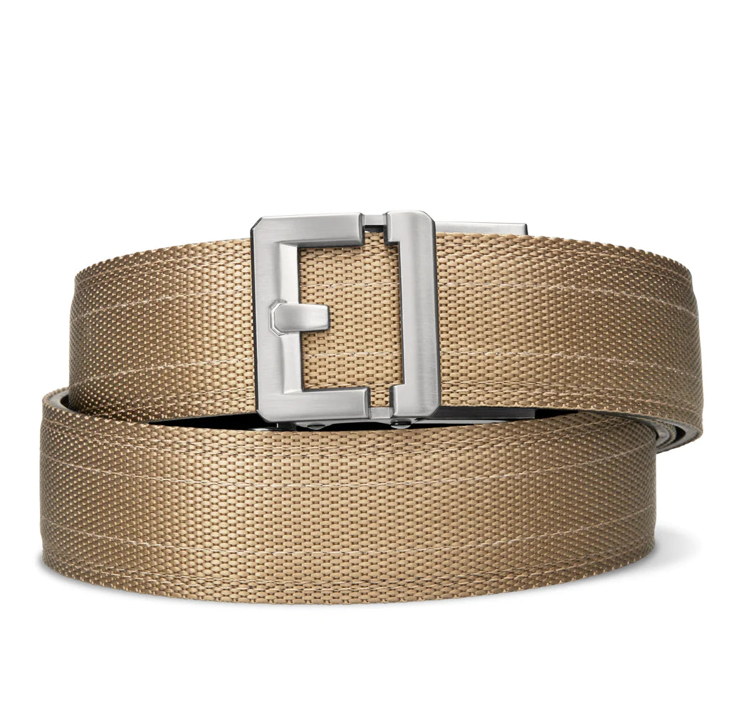 Kore Essentials is the originator of the ratcheting gun belt. We make the world’s best gun belt for concealed carry, everyday carry (EDC), ccw, law enforcement and military personnel.  What makes Kore gun belts the best? Several patented innovations. First, our gun belts use a micro adjustable track that’s sewn into the back of the belt. This track lets you - tighten or loosen – your belt ¼” at a time to over 40+ sizing points. The result = a perfect fit all day, every day.