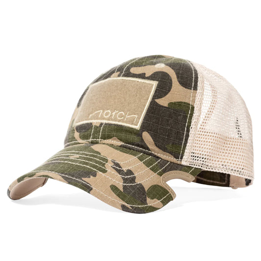 Notch Classic Adjustable Ponytail Operator Hat is the perfect combination of comfort and function. It features a slot for a ponytail or high messy bun so you can wear your hair like you want to with a hat on! It also features our patented notches that end the fight for face space between your hat & sunglasses. Made from 100% cotton, this adjustable, low-profile cap is perfect for the gym or everyday wear!
