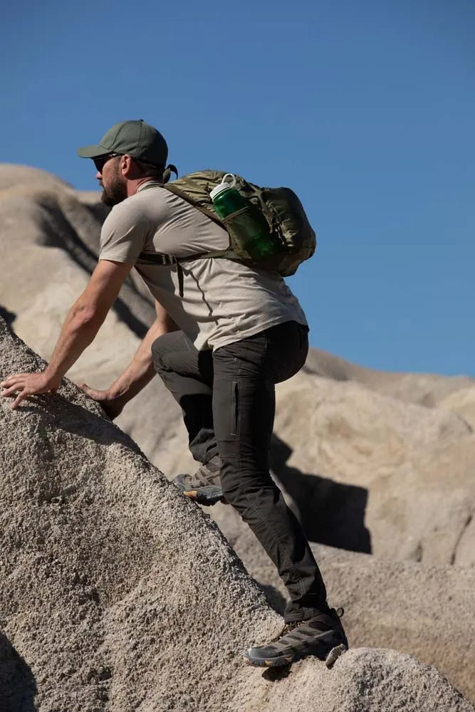 Exceptional performance no matter where your journey takes you with the lightweight, breathable, cotton-like feel of the Aeros pant. The durable cotton-nylon-spandex blend holds up to hiking and other outdoor activities, with articulated knees, double stitching, reinforced pockets and a tough eyelet snap to hold it all together on the job. Useful, low profile pockets keep all your EDC and other essentials close at hand while the casual look of the Aeros allows you to wear them anywhere.  
